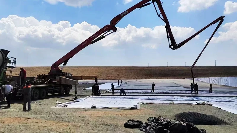 HDPE geomembrane full-coverage anti-seepage installation on reservoir bed and slopes.
